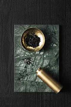 Zakkia SS 2015 - handmade green marble serving board and polished brass bottle and bowl: 