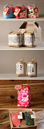 图中一二是台湾“掌生谷粒”设计的获红点奖的大米包装设计。