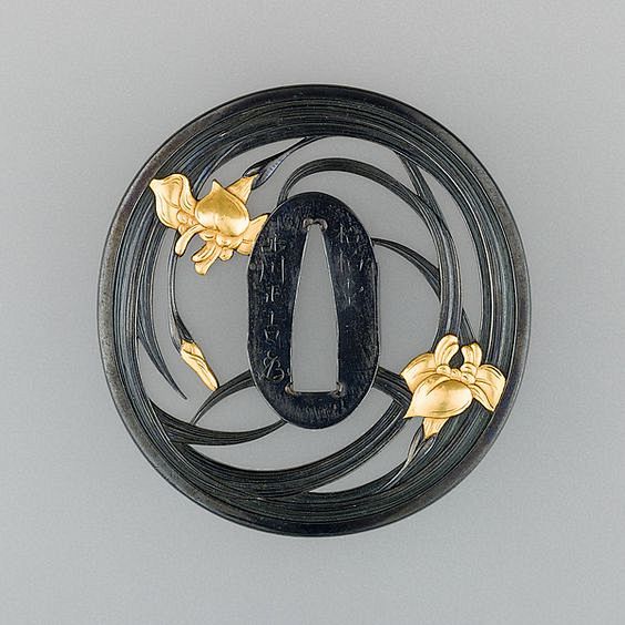 Tsuba, made of shaku...