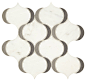 This may contain: a white and grey tile with circles on it