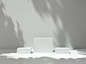 Pedestal for display with tree shadow on the wall Premium Photo