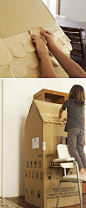 Building a charming cardboard box house