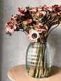 Pink and White Flowers in Blue Glass Vase