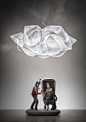 Slamp | Fabula suspension : Fabula appears to be a long, silky piece of fabric wound around itself.
