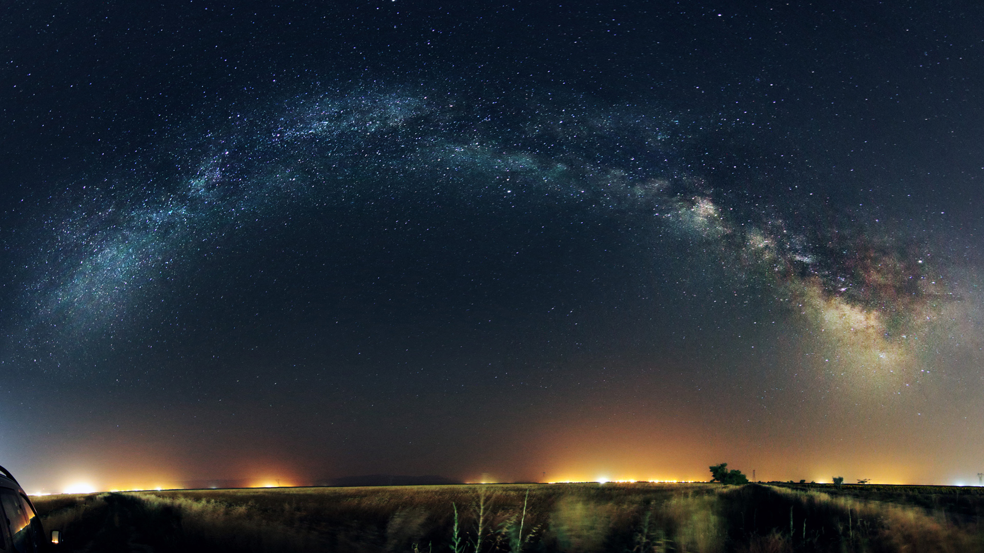 夜晚星星弧形星空桌面壁纸