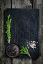 Black cutting board for cooking by Vladislav Nosick on 500px