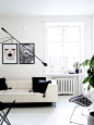 A Clean, Monochromatic Apartment in Helsinki - Design Milk : Helsinki-based interior designer Laura Seppänen created an all-white apartment that was clean and monochromatic, but at the same time, cozy and comfortable.