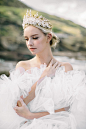 Queen of the Land and Sea: Stunning bridal inspiration from Hawaii | Oahu Wedding Inspiration : Take one jaw-dropping dress, a headpiece that's a work of art, and some epic backdrops and you have a recipe for certain editorial beauty. We're crushing hard 
