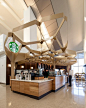 The Starbucks store at T51 in the Los Angeles Airport celebrates the craft of coffee making. Wagner and fellow designer Jennifer Porteous drew inspiration for the design from the pattern of foamy milk at the top of a handcrafted latte.: 