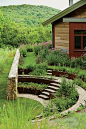 A terraced garden at Iron Mountain House, a home in Connecticut. Article about designer Thomas Woltz in WSJ.