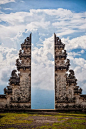 Pura Lempuyang Door, Bali, Indonesia: 'Puras are designed as an open air place of worship within enclosed walls, connected with a series of intricately decorated gates between its compounds. This is a split gate, known as candi bentar...' http://en.wikipe