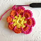 flower tutorial - I can't believe I'm pinning this.  I don't even crochet, but this looks cute AND easy!