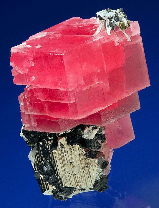 Rhodochrosite atop a...
