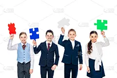 快乐的孩子们在正式穿着拿着拼图片孤立的白色