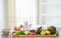 Balanced diet, cooking, culinary and food concept - close up of vegetables, fruits and meat on wooden table, stock photo