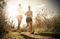 Caucasian couple running together on path by Gable Denims on 500px