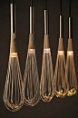 oh, lighted whisks, i love this!!!!!!!! could look cheesy though, in a very minimalistic and very clean kitchen above an island, it would be lovely