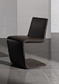 PHILLIPS - CHAIRS EN : PHILLIPS - CHAIRS EN Modernly designed and sinuously shaped chair. Innovative, sophisticated tailoring details, enhanced by nylon zips on the outer edges of the chair.