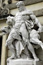 Hercules and Cerberus.- Antonin Pavel Wagner.           The 12th Labor of Hercules was the capture of  Cerberus, guardian of Hades -Hofburg palace. Vienna. Austria