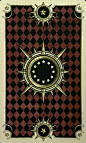 This may contain: the back side of a playing card with an image of a sun and stars on it