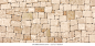 Masonry wall of stones with irregular pattern texture background