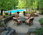 Example of a classic concrete paver patio design in Minneapolis