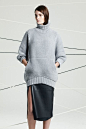 For the next winter vortex, this cozy gray blue cropped sleeved sweater and slit to there raw leather skirt are a must. Chalayan | Pre-Fall 2014 Collection | Style.com