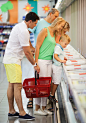 Family shopping together in a supermarket by Danil Roudenko on 500px