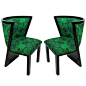 A Pair Of 30's French Art Deco Chairs In Ebonized Mahogany and new Malachite inspired textile upholstery.