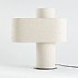 Heron Glowing Table Lamp | Crate and Barrel : Shop Heron Glowing Table Lamp.  Ivory linen shapes a sculptural table lamp that glows from within.  Stretched over a drum frame and the tall cylinder that supports it, the nubby fabric gently diffuses light to