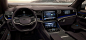 Sweeping view of the instrument panel and dash in the Grand Wagoneer concept, highlighting the metal framing, cluster display and dual touchscreens.