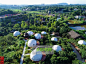 12 White PVC Fabric Eco Dome Tents, Deep Forest Geodesic Dome Resort