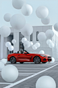 PROJECT Z4 : In order to highlight specifics and feeling of driving Z4 the following were used: Cloth sheet coloured in the car's finish as a symbol bright, boldness and streamline form of the carBalloons as symbol of air and freedom of controlTechnique &
