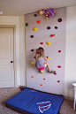 Rock wall for kids play room- how fun! What a great way to keep the kids active, too!