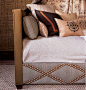 Guest Room/Study Details The daybed’s side rails were customized using oversized brass nail heads in a graphic X-shape pattern.