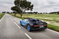 Bugatti-Chiron-rear-three-quarter-in-motion-03