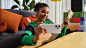 May be an image of 1 person, phone, indoor and text that says 'S 1 Redmi dmi'