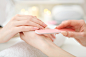 closeup-shot-woman-nail-salon-getting-manicure
