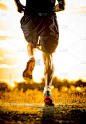 young man strong legs off trail running at amazing