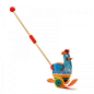 A beautifully painted, colourful, wooden push along toy.  Betty the rainbow hen will flip flop her feet along in front of your little one while she is pushed along.  The push along handle is approximately 50cm in length.