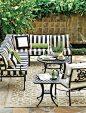 Black-and-white stripes are a fun way to give your patio set a new look.: 
