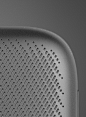 其中可能包括：the back side of a speaker with holes in it