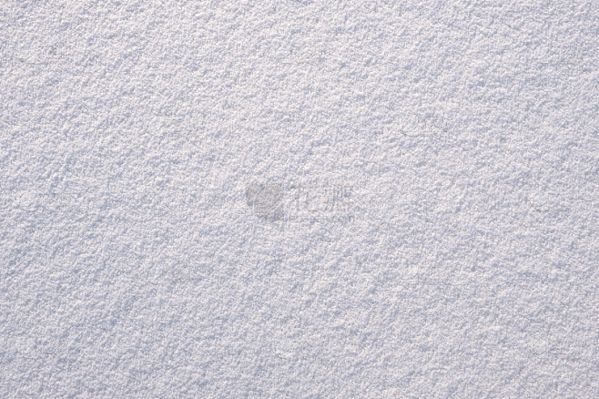 表面纹理洁白细腻的雪花背景，冬季背景