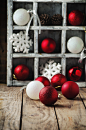 Christmas card with balls on the wooden table