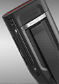 This may contain: an electronic device is shown on a gray background with red accents and black trims