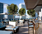 Kimpton EPIC Hotel Miami, Florida Bar Drink Eat Modern Outdoors Scenic views Waterfront chair property condominium house building Architecture home Villa outdoor structure Resort Courtyard backyard