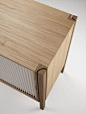 Pleat Cabinet | A functional wooden cabinet with a pleated textile curtain