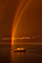 An amateur photographer was stunned when he captured rare meteorological phenomenon - a reflection rainbow. Phil Thompson was walking along a jetty at the Bellarine Peninsula in Victoria, Australia, when he spotted a rainbow reflecting off the sea to crea