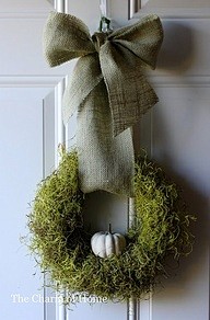 moss wreath with lit...