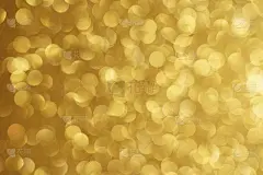 金色的焦外成像背景。纹理箔和彩纸散花，金色的轻尘。圣诞和新年晚会的背景。